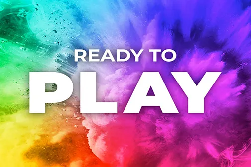 Ready to play text with a exploding multicolour powder background